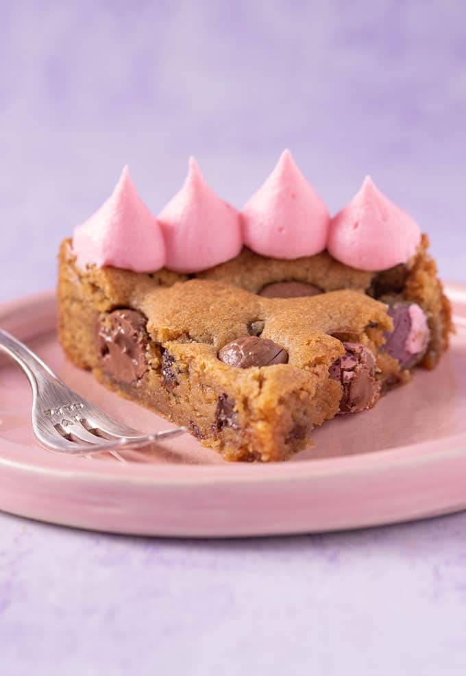 A close up shot of a slice of Easter Egg Cookie Cake