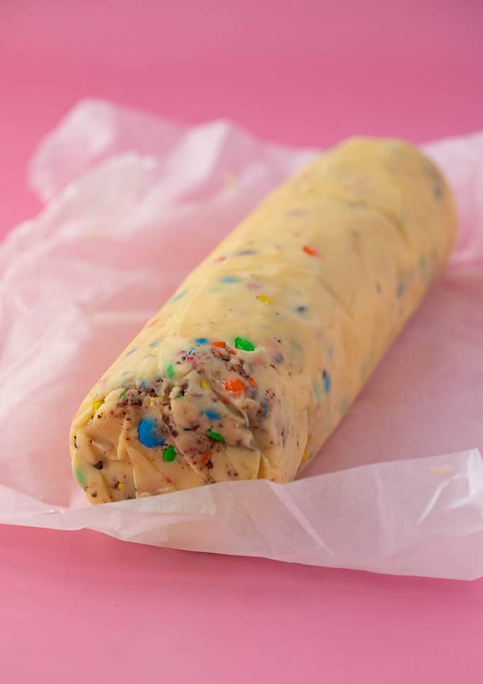 A log of Shortbread Cookie Dough on a piece of baking paper