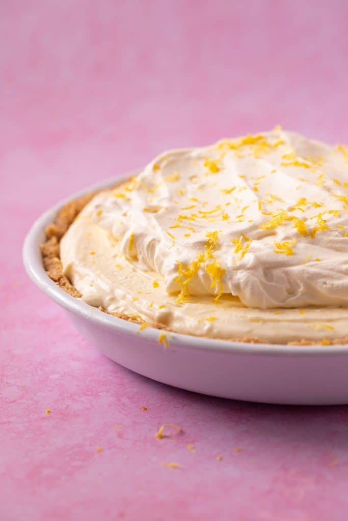A homemade Lemon Pie topped with whipped cream