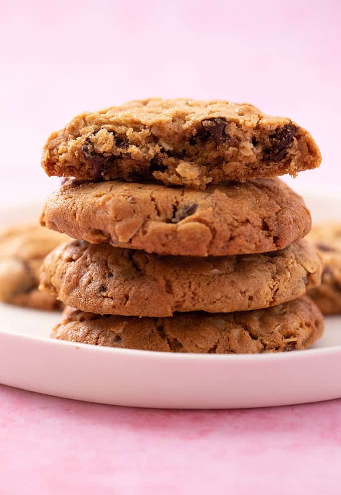 A stack of homemade Peanut Butter Oatmeal Cookies on a white plate