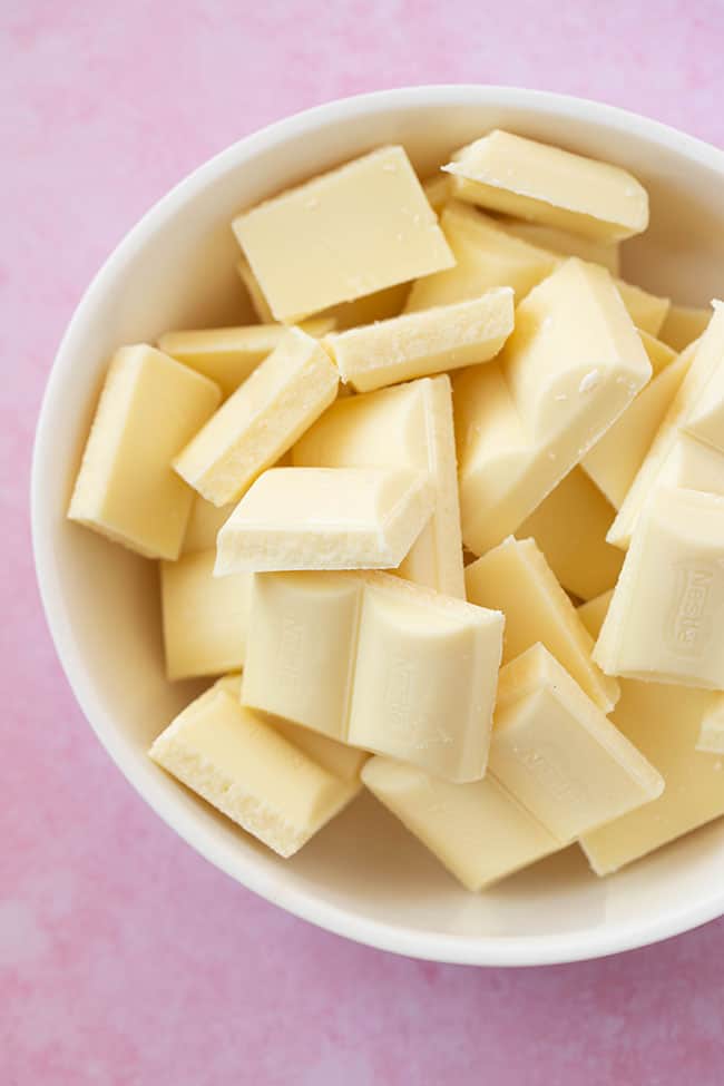 A bowl filled with white chocolate pieces