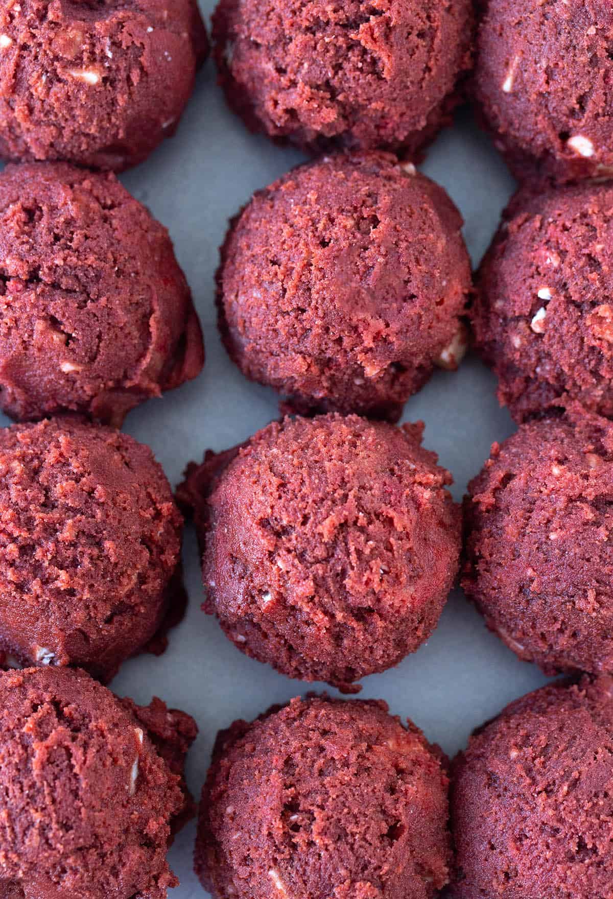 Top view of balls of red velvet cookie dough
