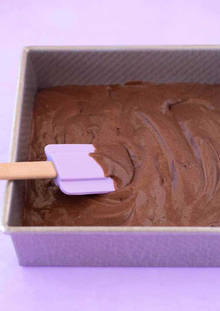 A pan filled with chocolate brownie batter
