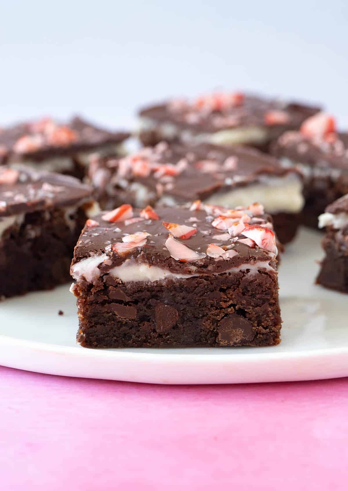 Close up of a fudgy Peppermint brownie on a white plate