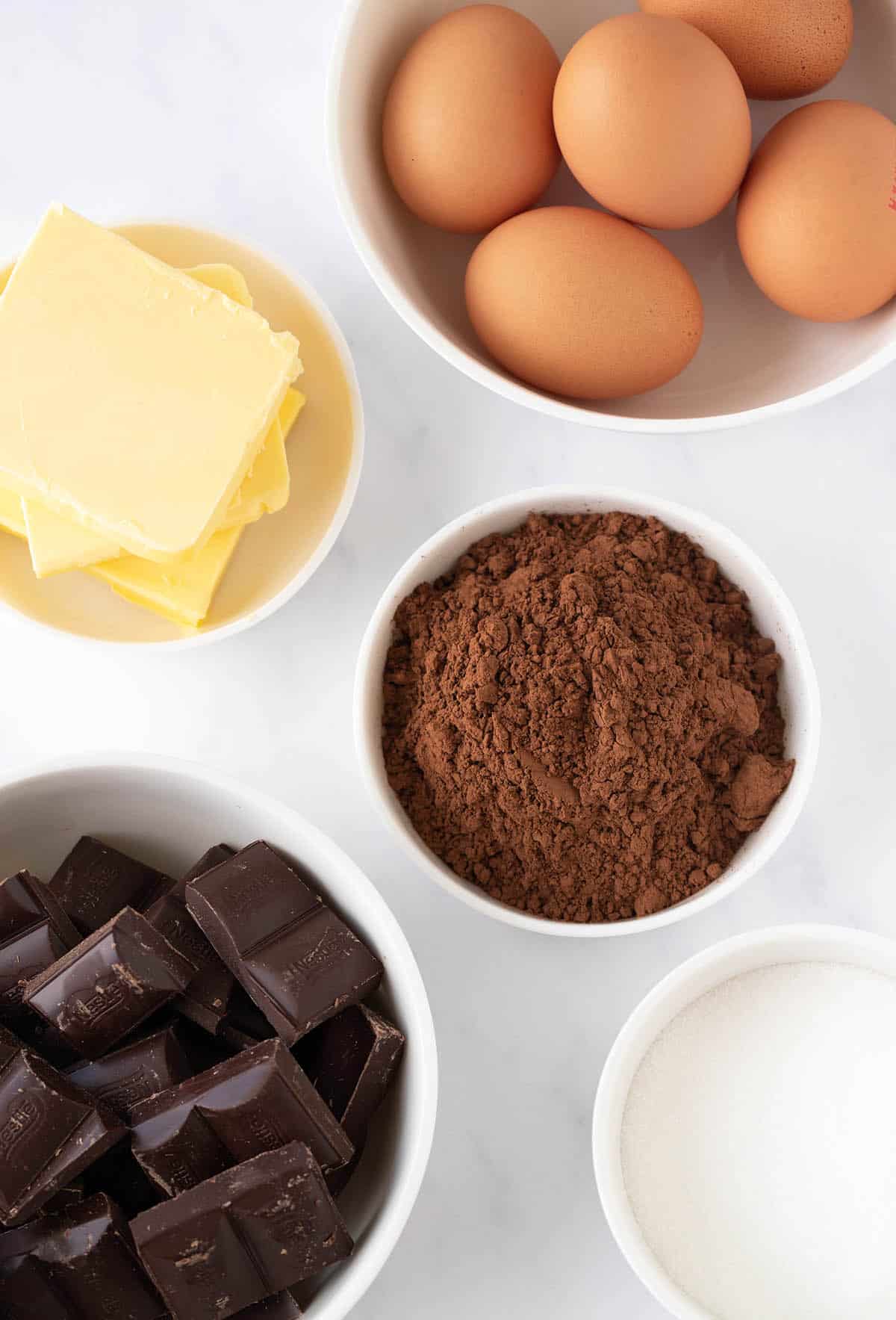 All the ingredients needed for Flourless Chocolate Cake laid out ready to bake.
