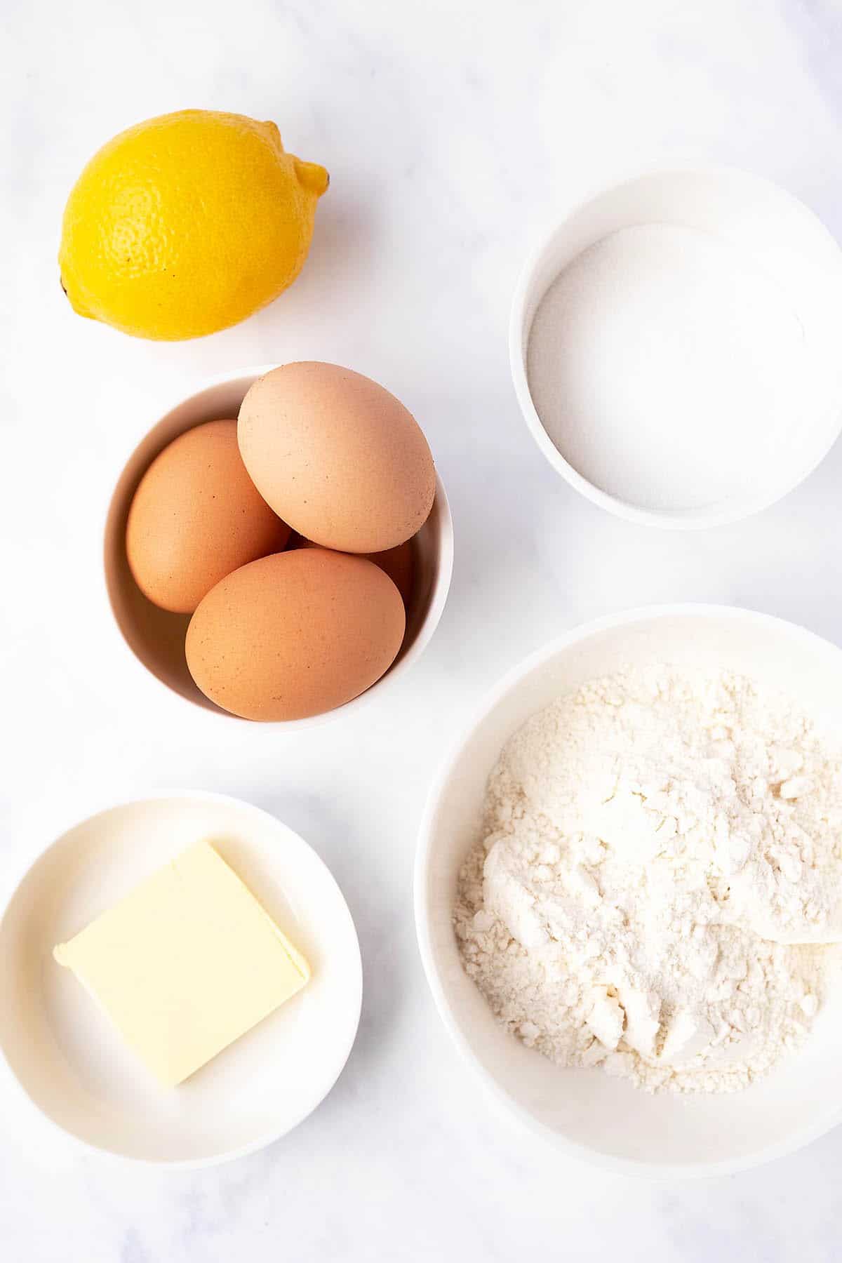 Top view of the ingredients needed to make a genoise sponge.