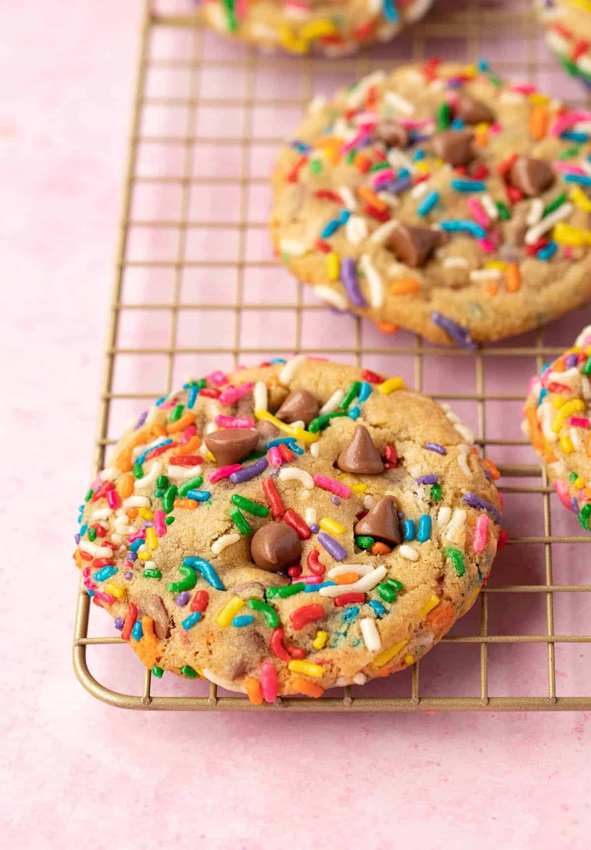 Fresh-out-of-the-oven Funfetti Cookies on a wire rack. 