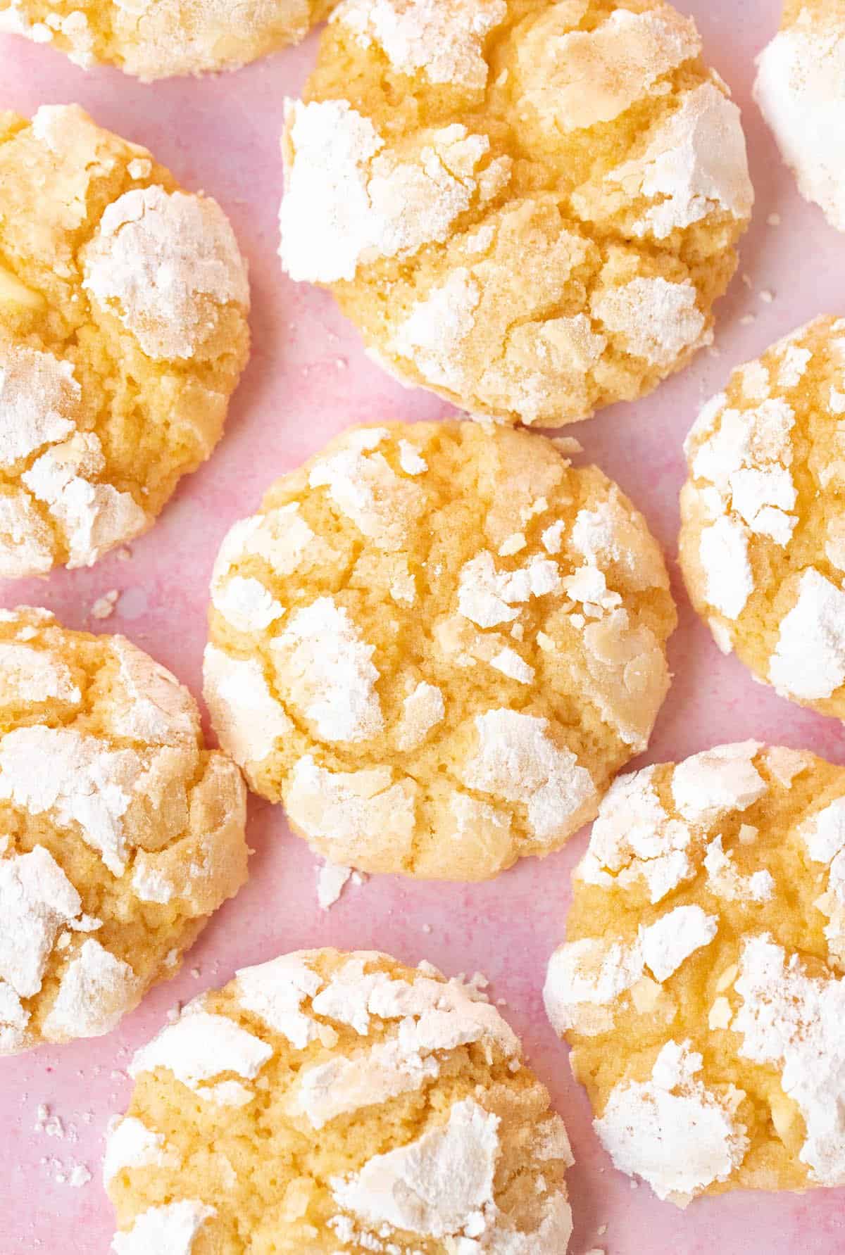 Top view of beautiful Lemon Crinkle Cookies on a white background.