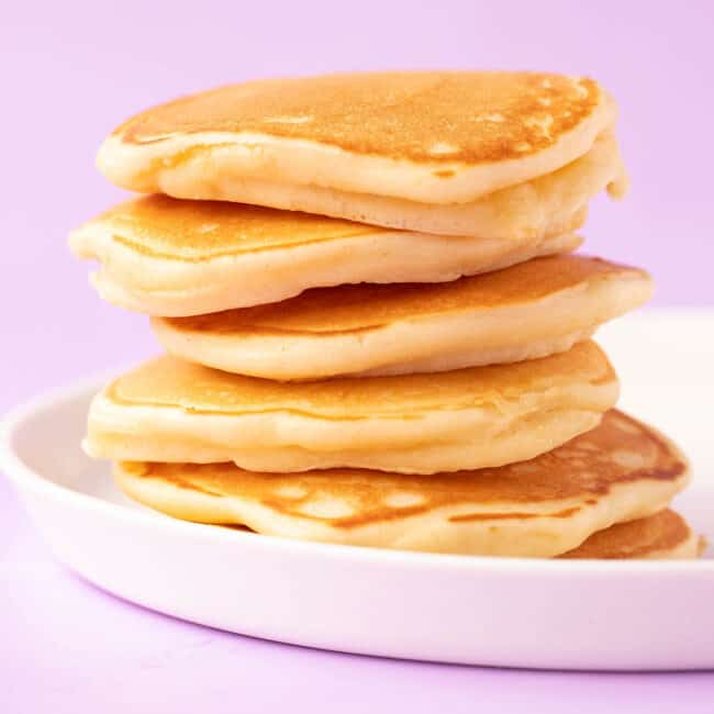 A stack of mini pancakes made from scratch.