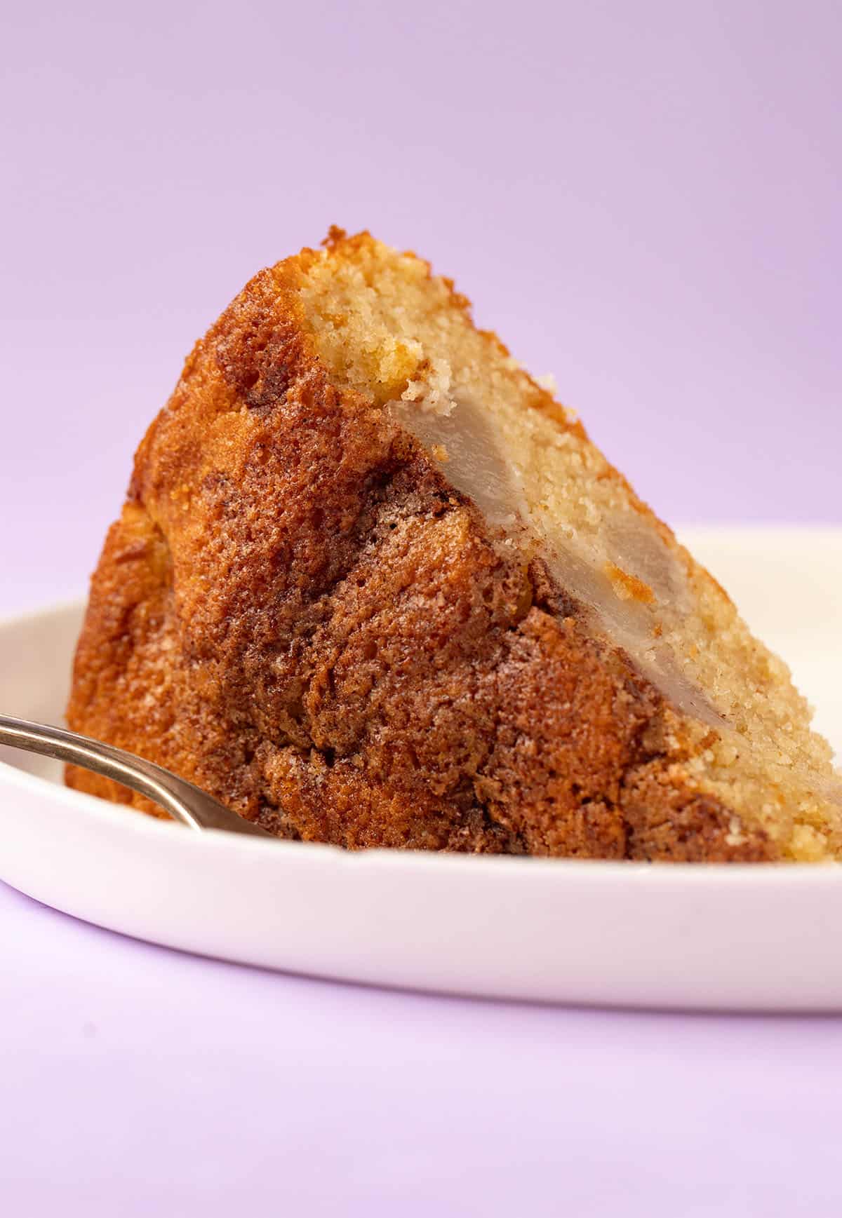 Slice of Pear Cake showing crisp crust. 