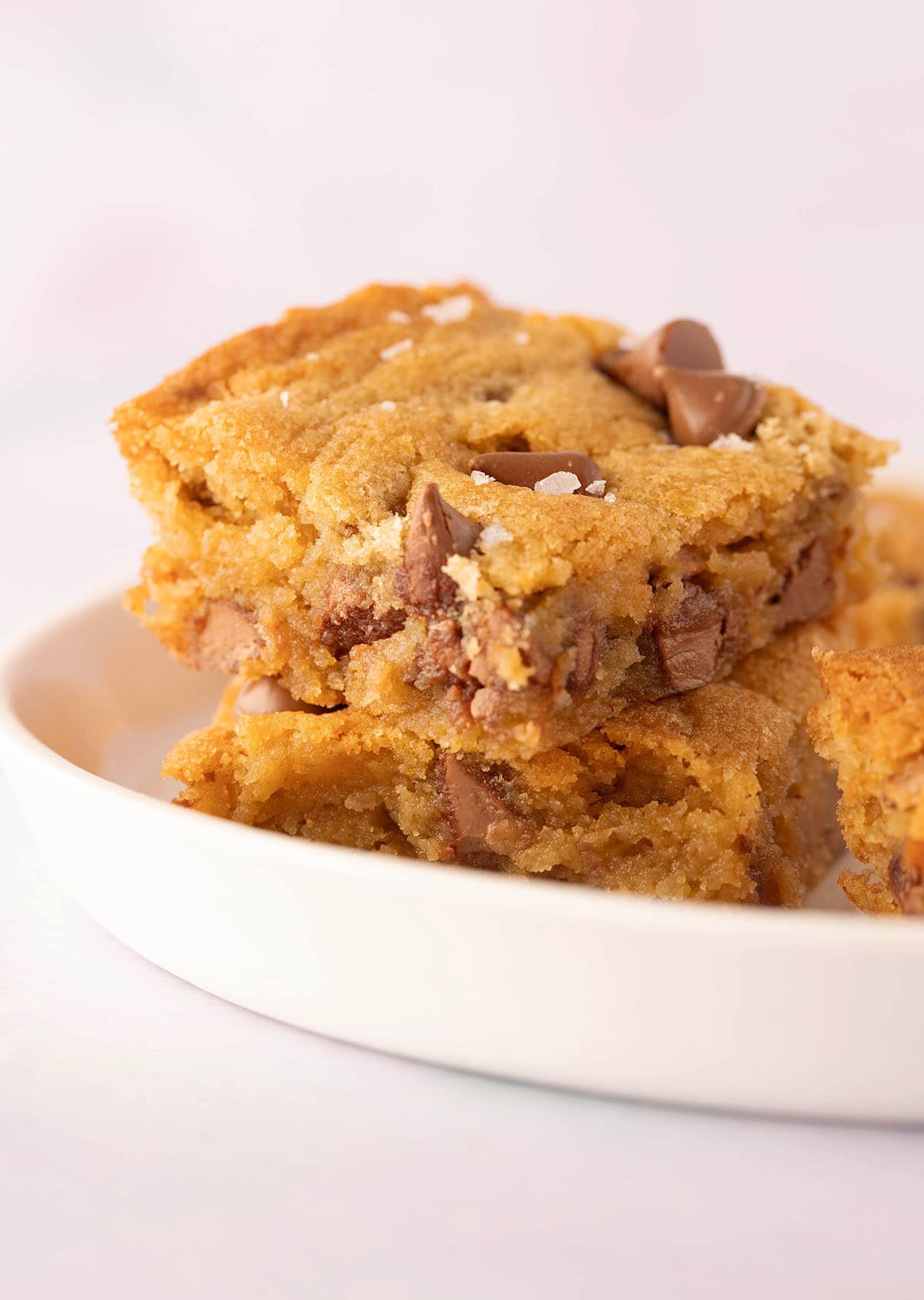 Two Congo Bars sitting on white plate. 