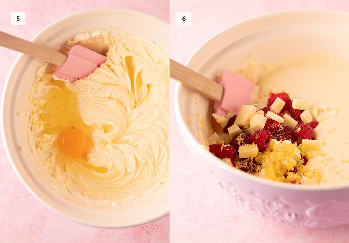 Mixing bowl filled with cream cheese, raspberries, lemon zest and white chocolate. 