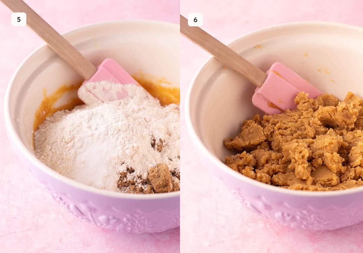Pink mixing bowl of peanut butter miso cookie dough with dry ingredients added. 