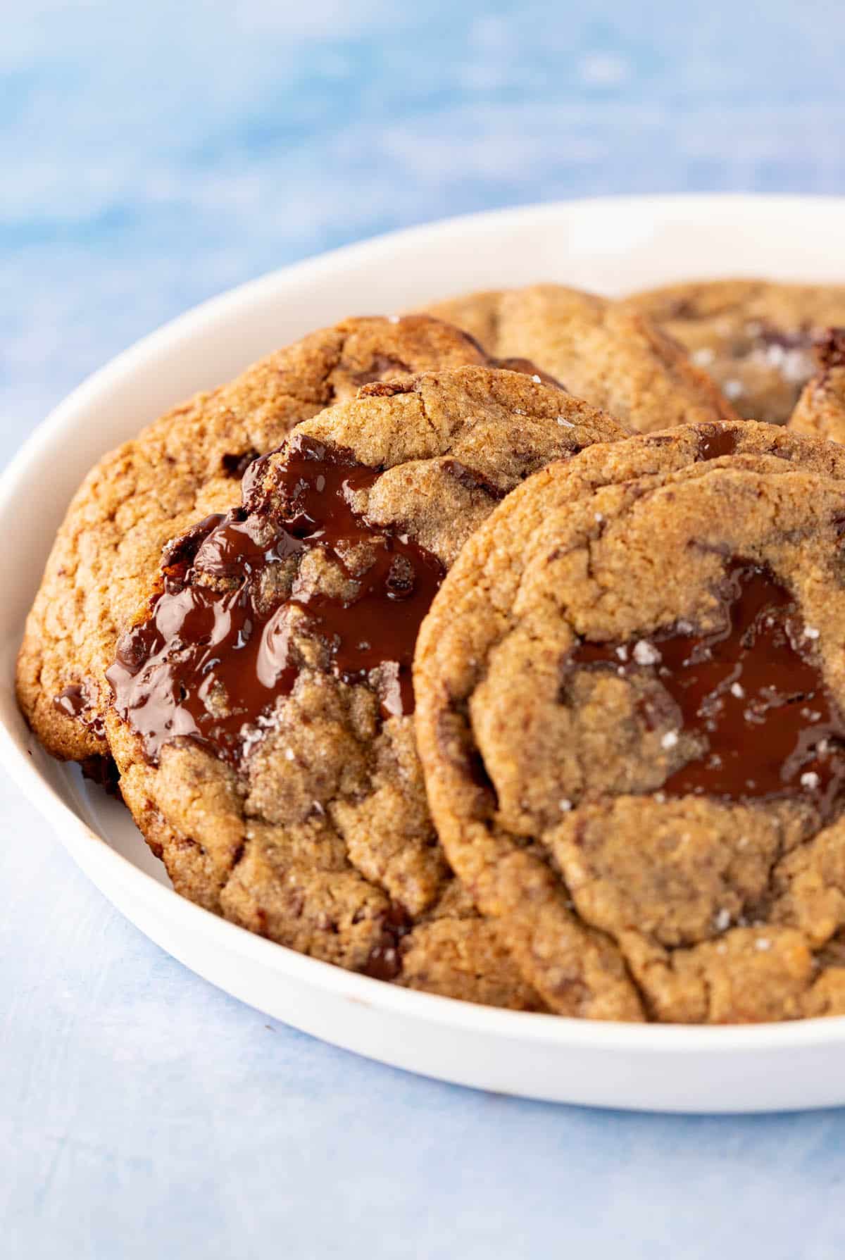 A plate of homemade Rye Cookies on a blue background.