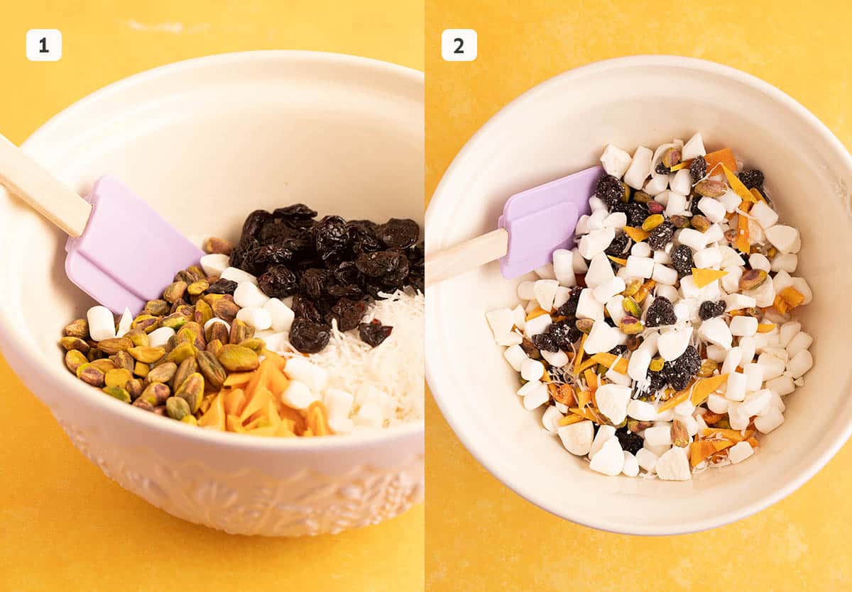 A large mixing bowl filled with dried fruit and marshmallows.