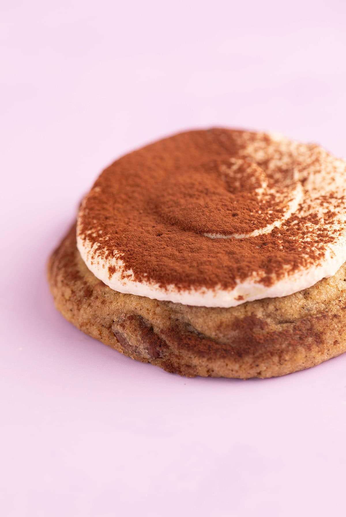 Close up of a beautiful Tiramisu Cookie topped with mascarpone frosting. 