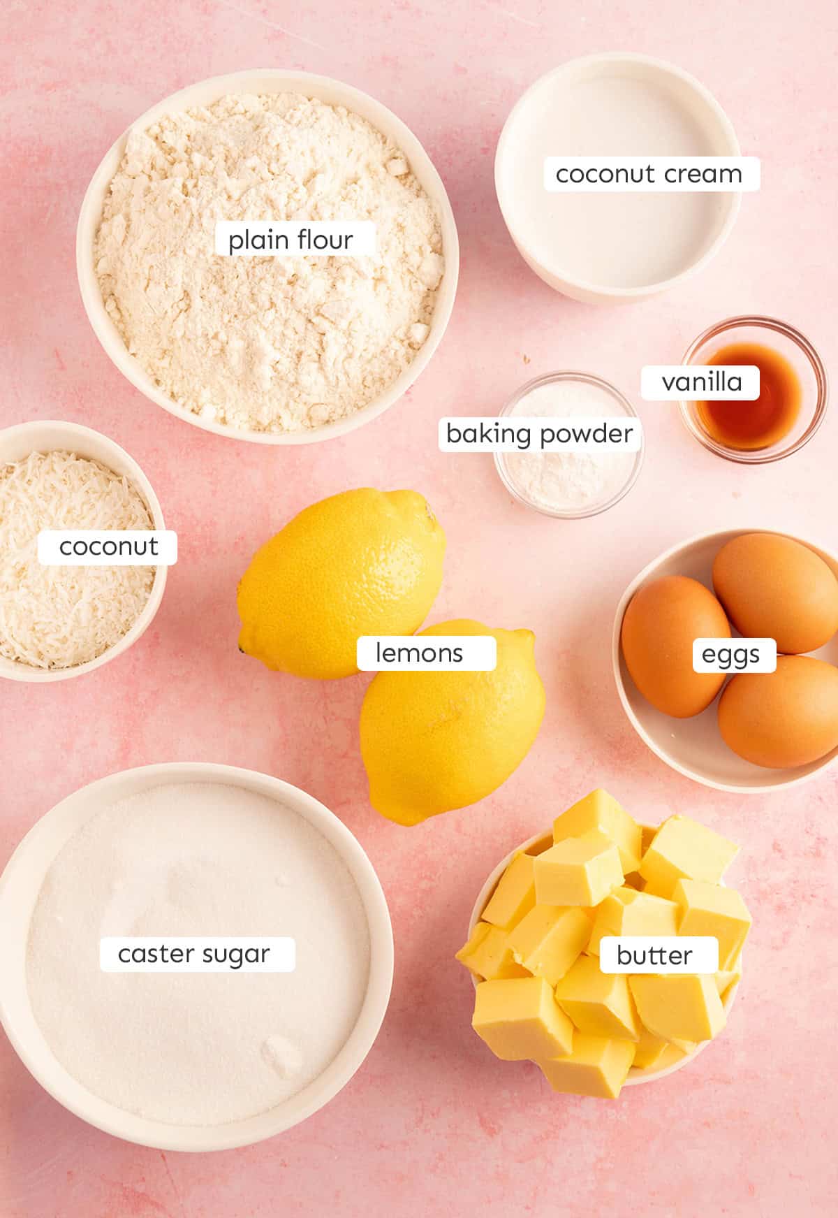 All the ingredients needed to make a Lemon Coconut Cake from scratch.