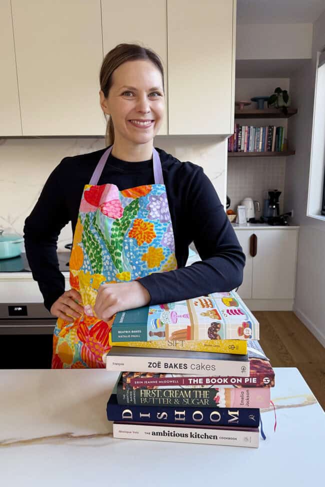 Jessica Holmes from Sweetest Menu smiling in her kitchen.