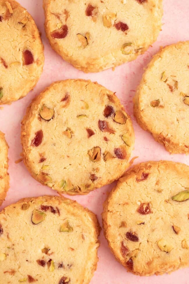 Beautiful Santa's Whiskers cookies on a pink backdrop.