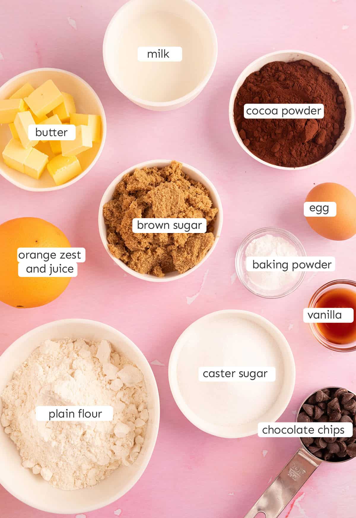 All the ingredients needed to make chocolate orange pudding from scratch.