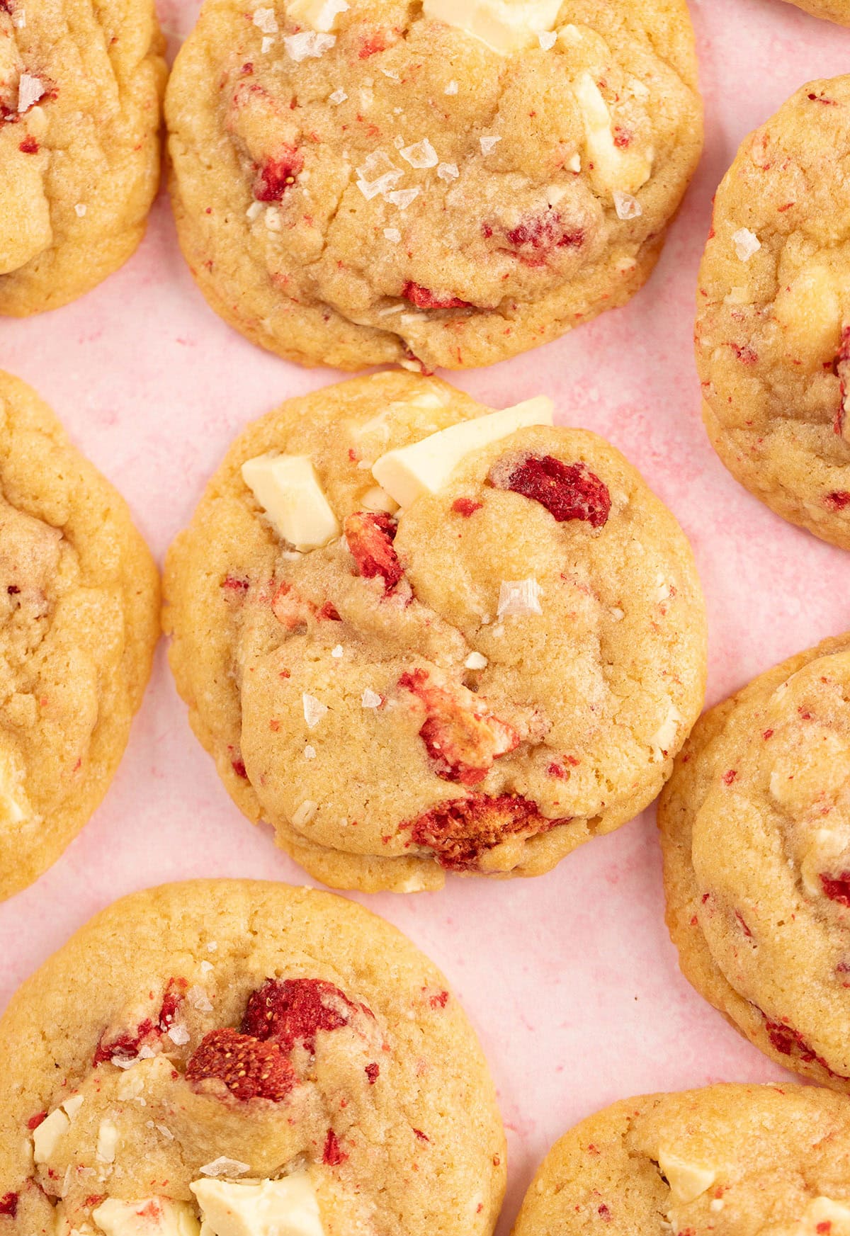 A group of Strawberry Cookies on a pink background. 