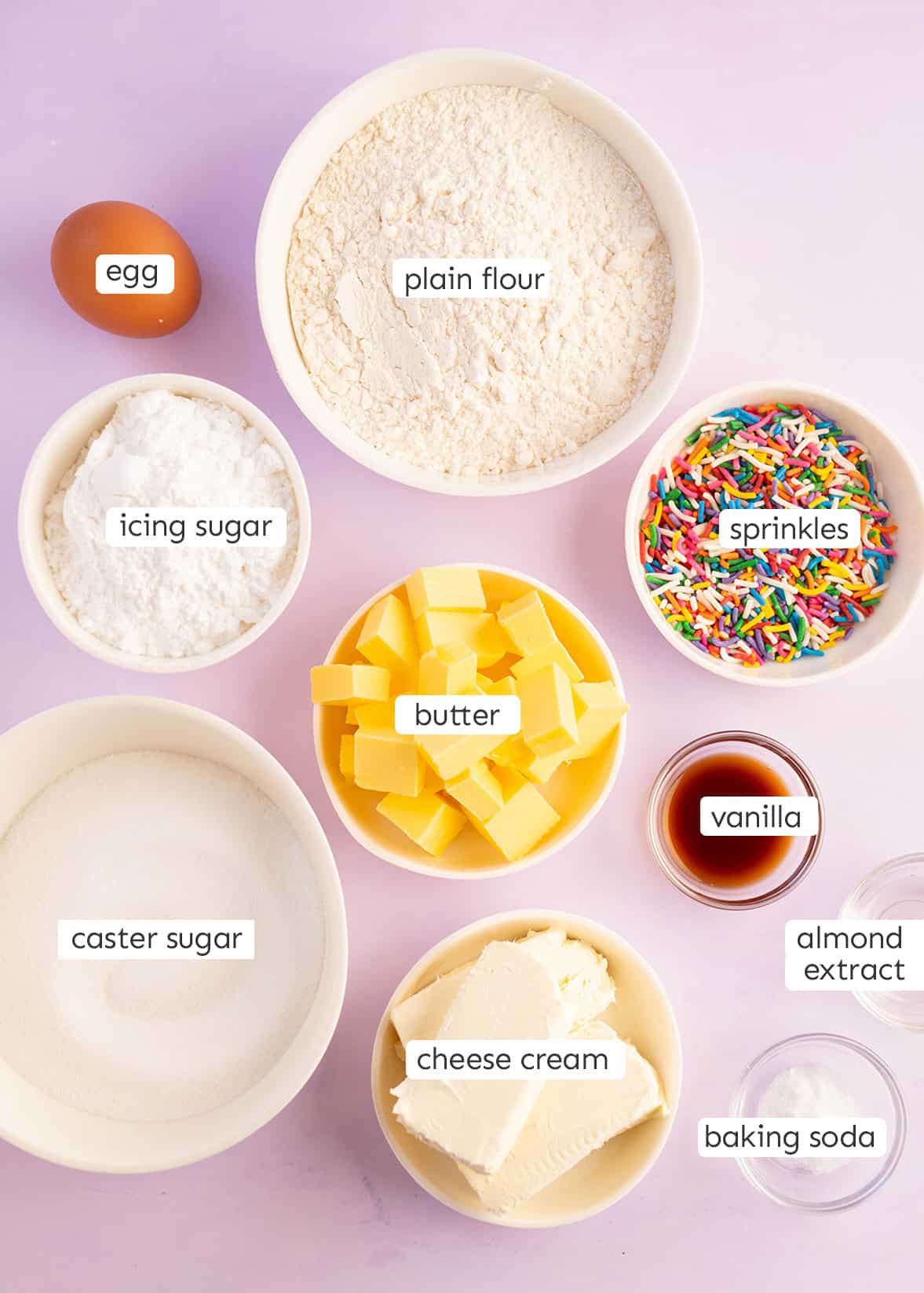 All the ingredients needed to make a batch of birthday cake cookies from scratch.